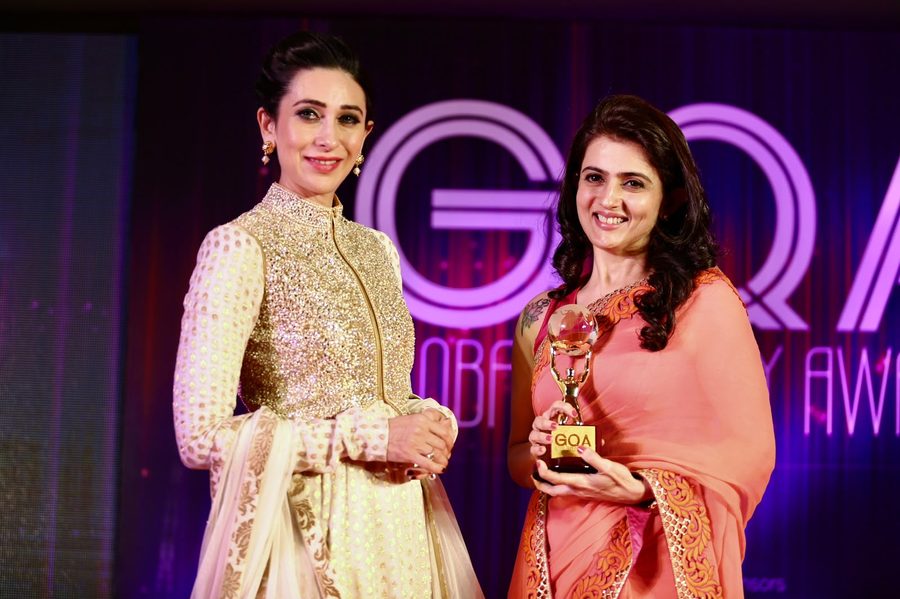 Dr. Vandana receiving the GOA Global Award
